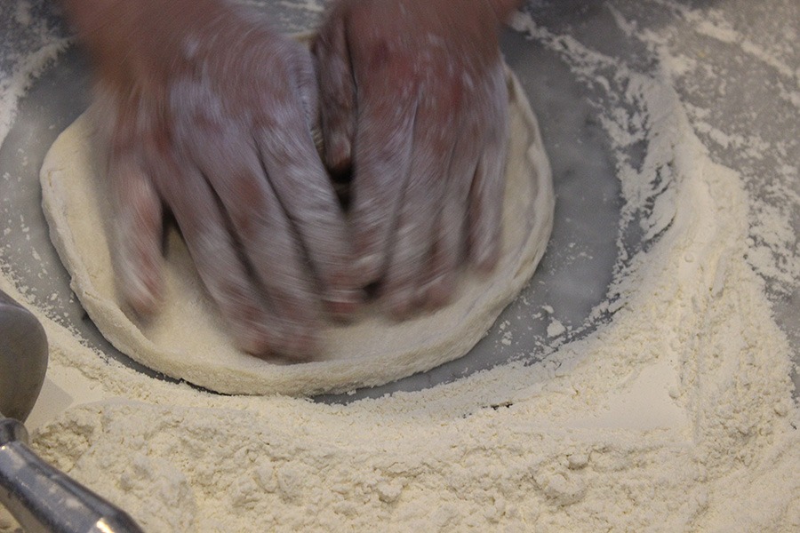 Andiamo Trattoria kitchen - authentic pizza dough craftsmanship