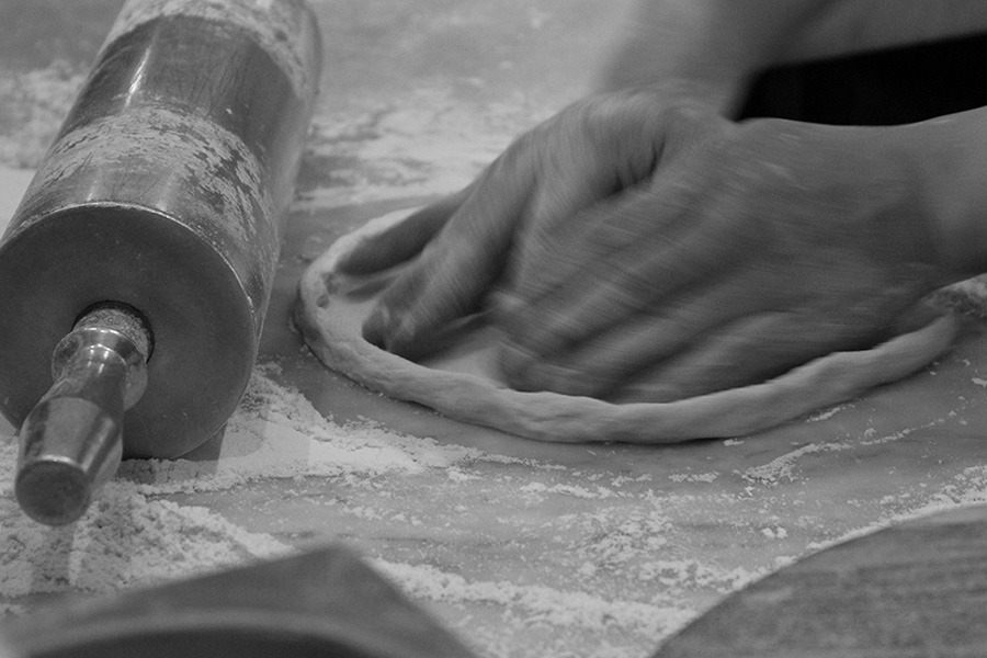 Stonebaked pizza preparation - award-winning Italian pizza Sydney
